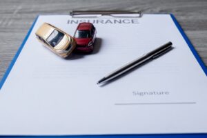car and pen on insurance documents car insurance 2023 11 27 05 07 23 utc Resized