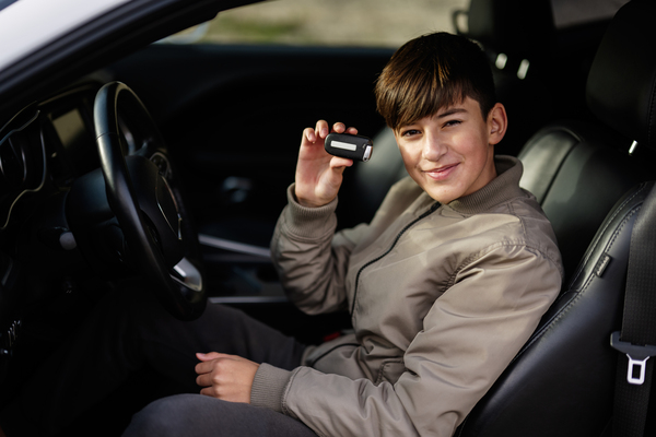 teenager boy sit in muscle car young teen driver 2023 11 27 04 49 52 utc Resized