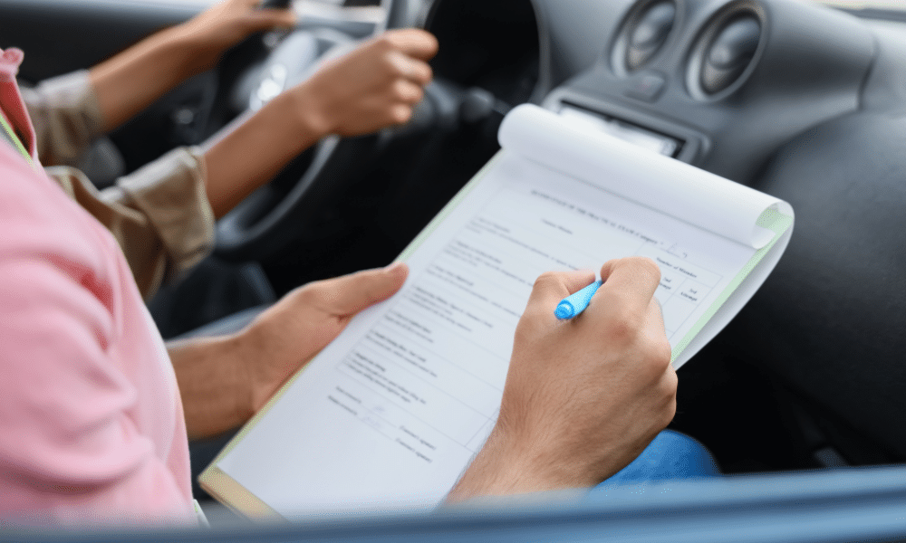 Alt-text- Manual driving lessons with a certified instructor and an adult student