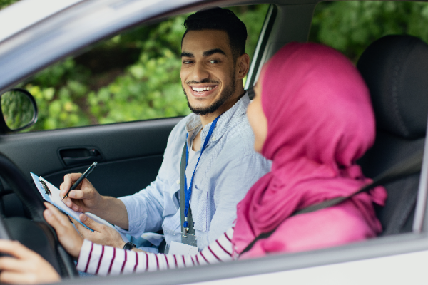 driving-school-test-handsome-young-arab-instructo-2023-11-27-04-53-14-utc_resized